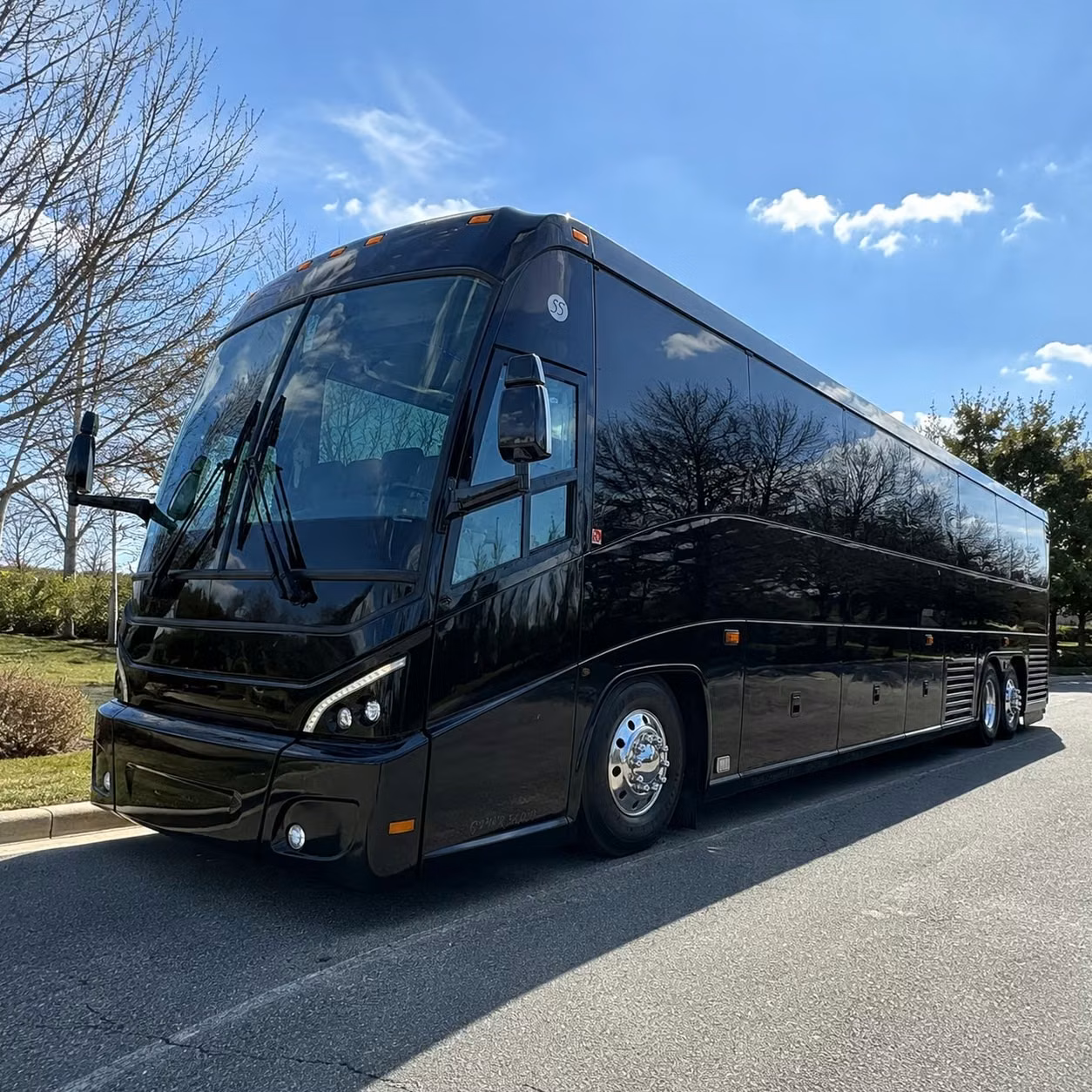 dod compliant charter bus rentals for military personnel moving through southeast michigan