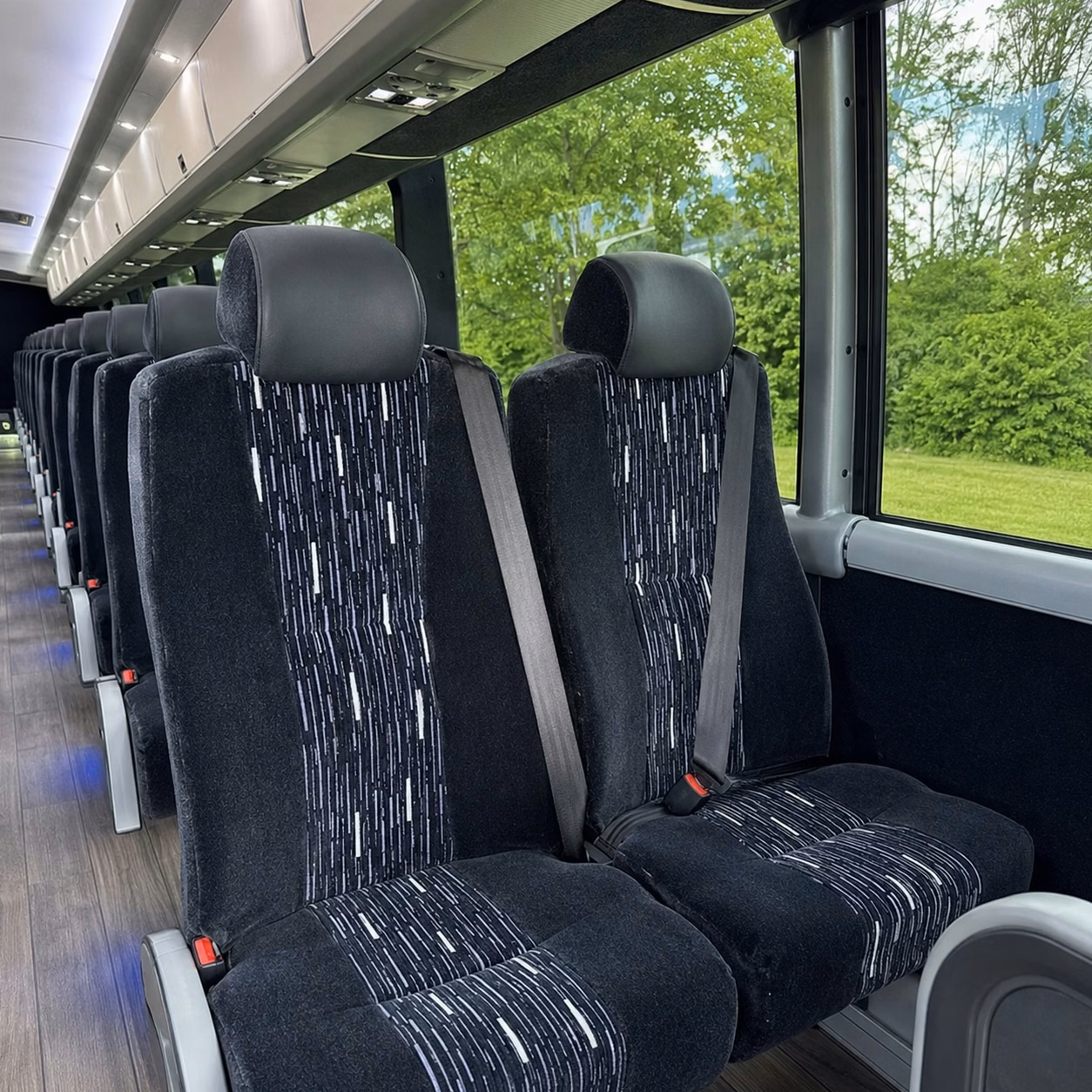 how trip distance and duration affect ann arbor charter bus rental rates